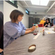 People sitting at a table working on a project