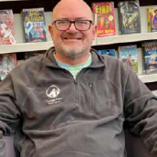 photo of bald man with glasses and white beard