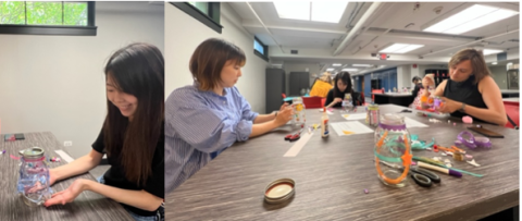 People sitting at a table working on a project